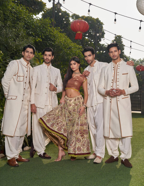 Regal Ivory Sherwani & Embroidered Lehenga Set – Men & Women Collection
